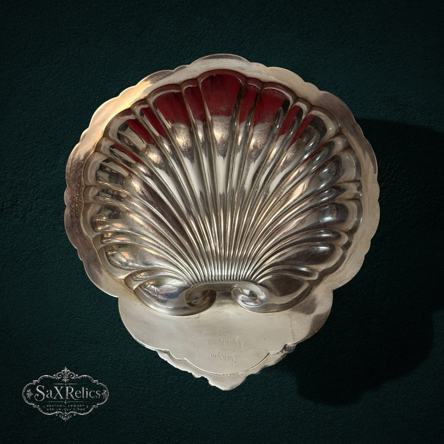 My Store vintage silver-plated scalloped shell serving dish with ornate border on dark background