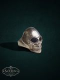Calavera sterling silver skull ring with elongated skull and deep eye sockets