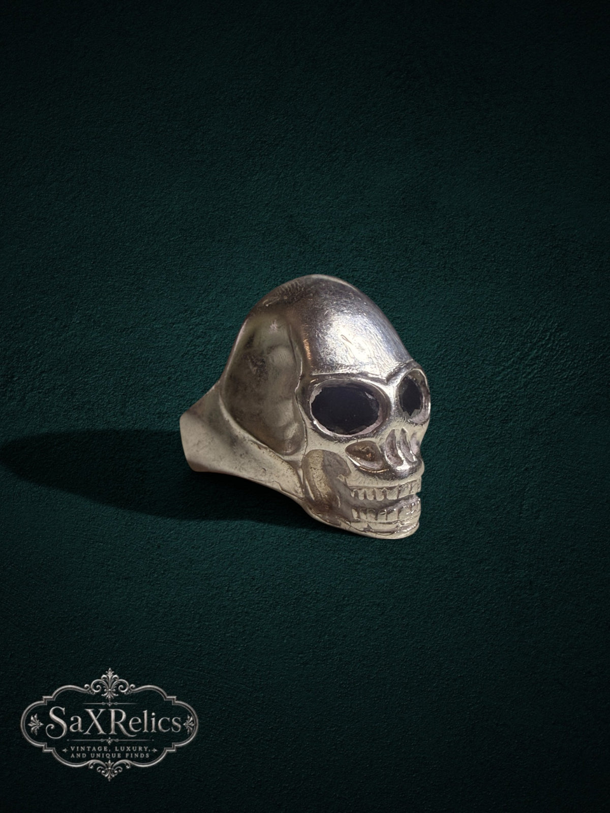 Calavera sterling silver skull ring with elongated skull and deep eye sockets