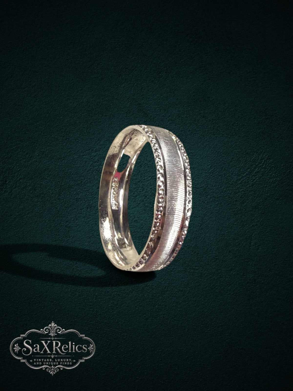 My Store vintage-inspired silver band ring with a brushed center finish and intricate beaded edges.
