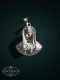My Store SAXRelics silver Virgin Mary pendant featuring a detailed Madonna relief with delicate star accents.
