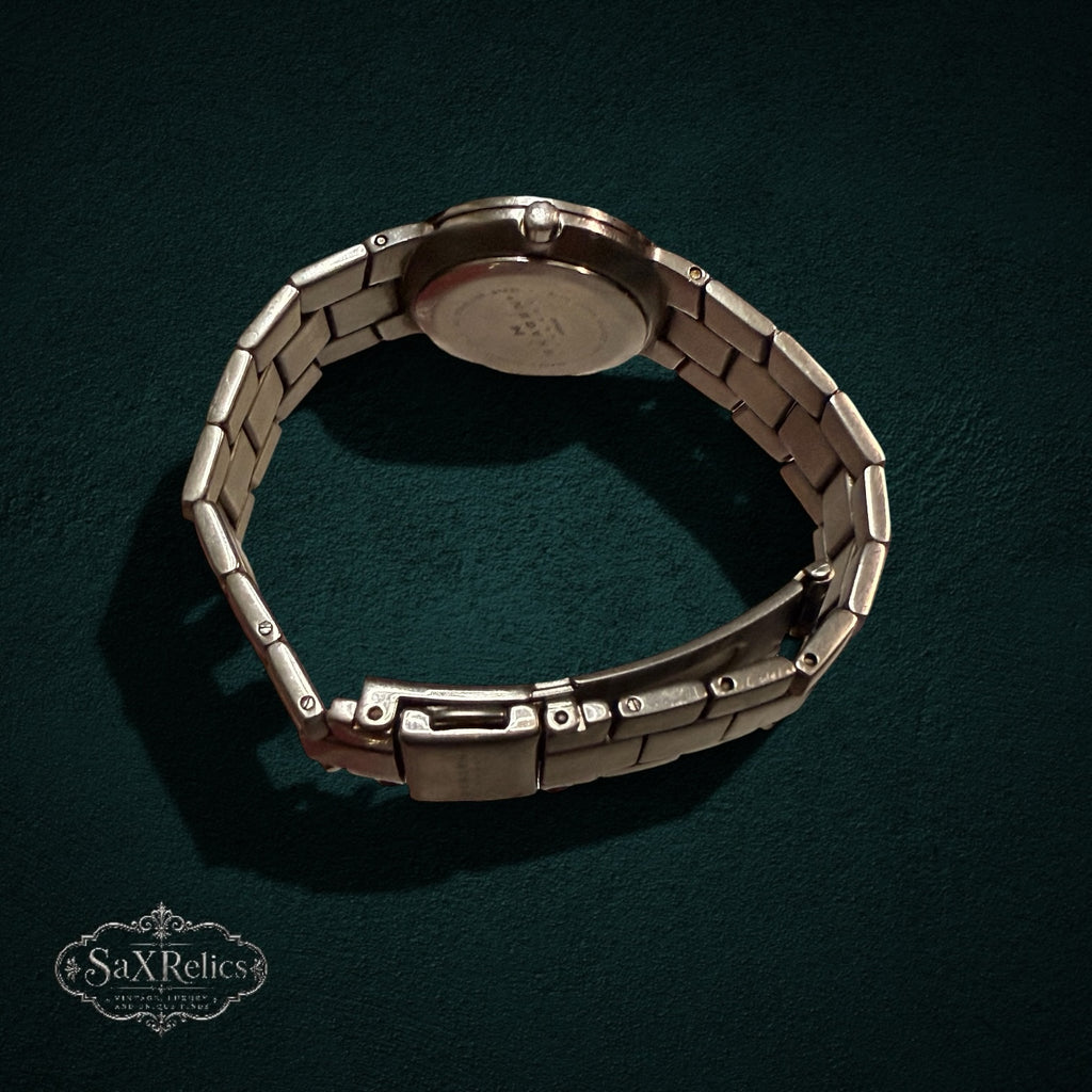 SaX Relics Skagen Denmark link bracelet watch showing the caseback and fold-over clasp