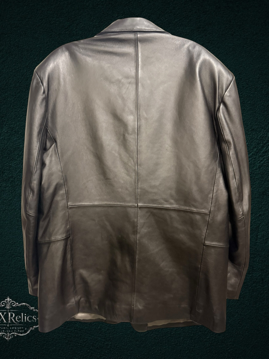 Back view of a My Store Stafford genuine leather blazer in black with structured tailoring and a smooth finish.