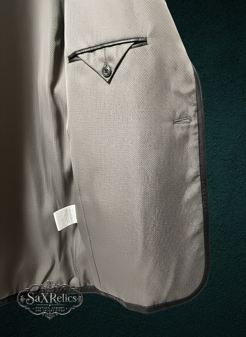 Interior view of My Store Stafford genuine leather blazer featuring a textured grey polyester lining and pocket.