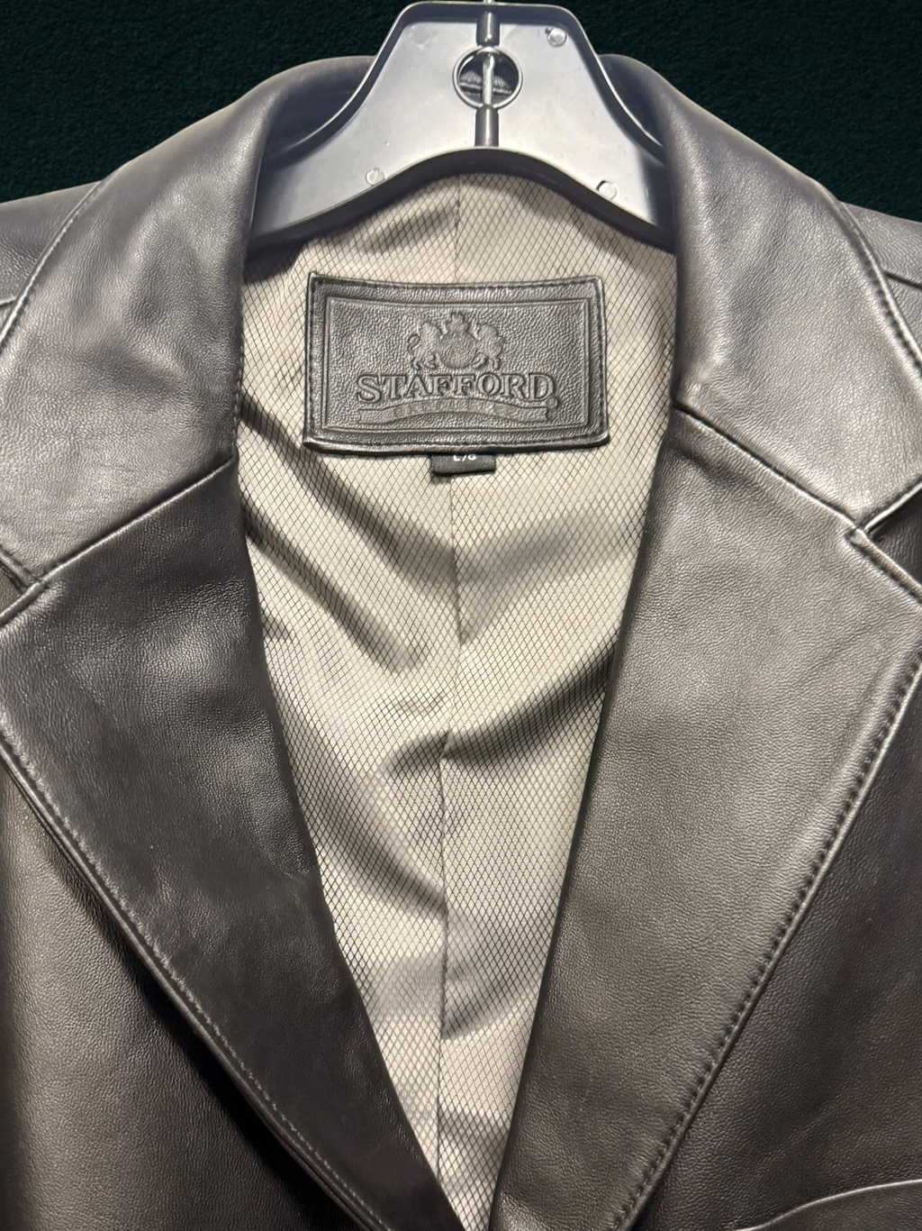 My Store Stafford black genuine leather blazer with structured lapels and textured interior lining.