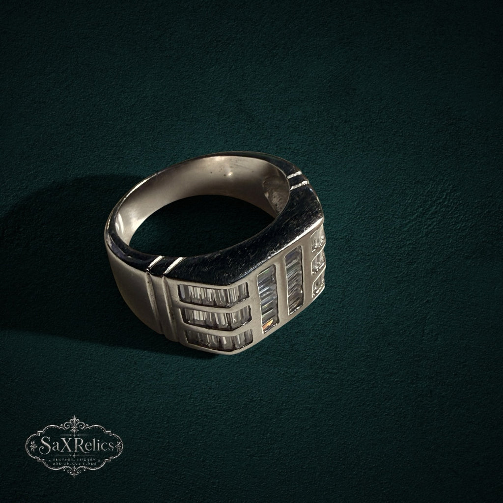 My Store SAXRelics sterling silver statement ring featuring baguette-cut stones in an architectural design.