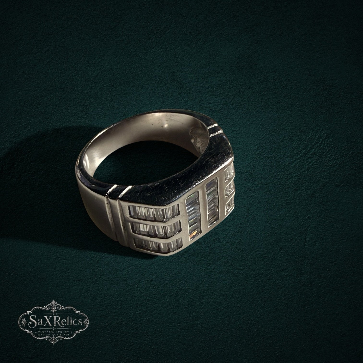 My Store SAXRelics sterling silver statement ring featuring baguette-cut stones in an architectural design.