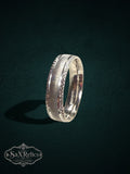My Store sterling silver band ring with a brushed center and ornate decorative edges in a vintage-inspired style.