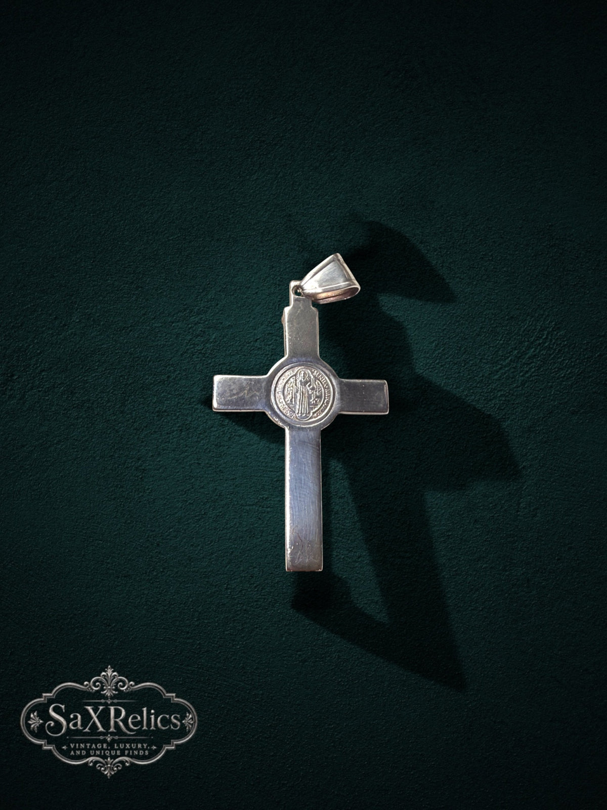 My Store 925 sterling silver crucifix pendant featuring a central Saint Benedict medal on a dark green background