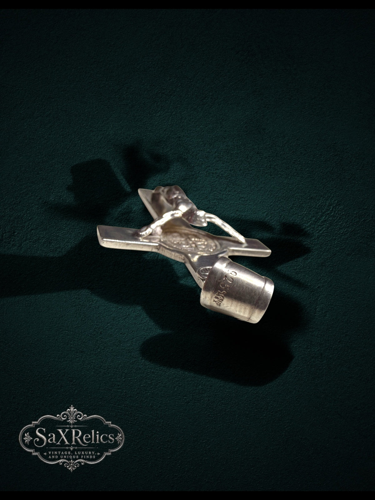 My Store 925 sterling silver crucifix pendant featuring a detailed corpus and Saint Benedict medal on dark background