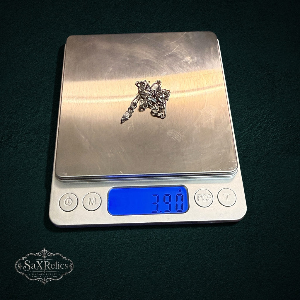 My Store 925 sterling silver Figaro chain bracelet weighing 3.90 grams on a digital scale