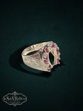 My Store sterling silver horseshoe statement ring featuring red rubies and clear stones with intricate side detailing.