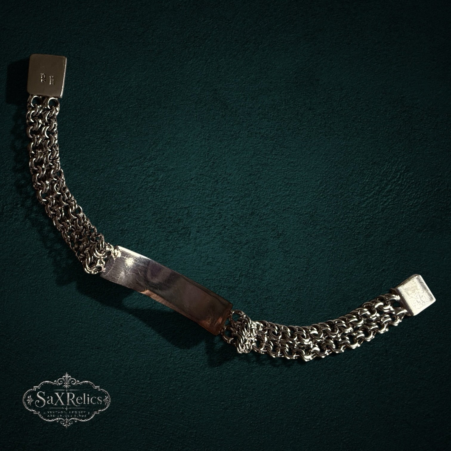 SaX Relics — Cédula sterling silver ID bracelet, full length showing the woven-link construction.