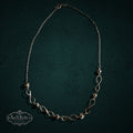 SaX Relics — Infinito Mexican sterling silver necklace alternating infinity links with polished beads.