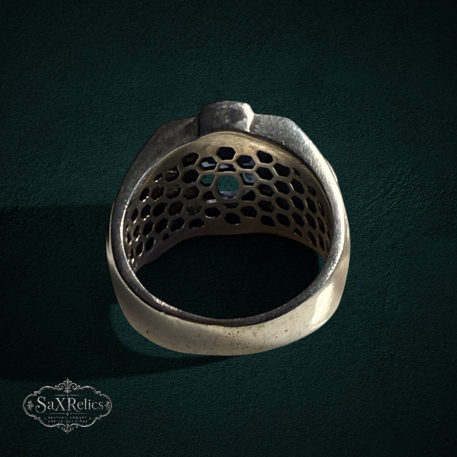 My Store SAXRelics sterling silver ring interior view showing the unique honeycomb-patterned gallery design.