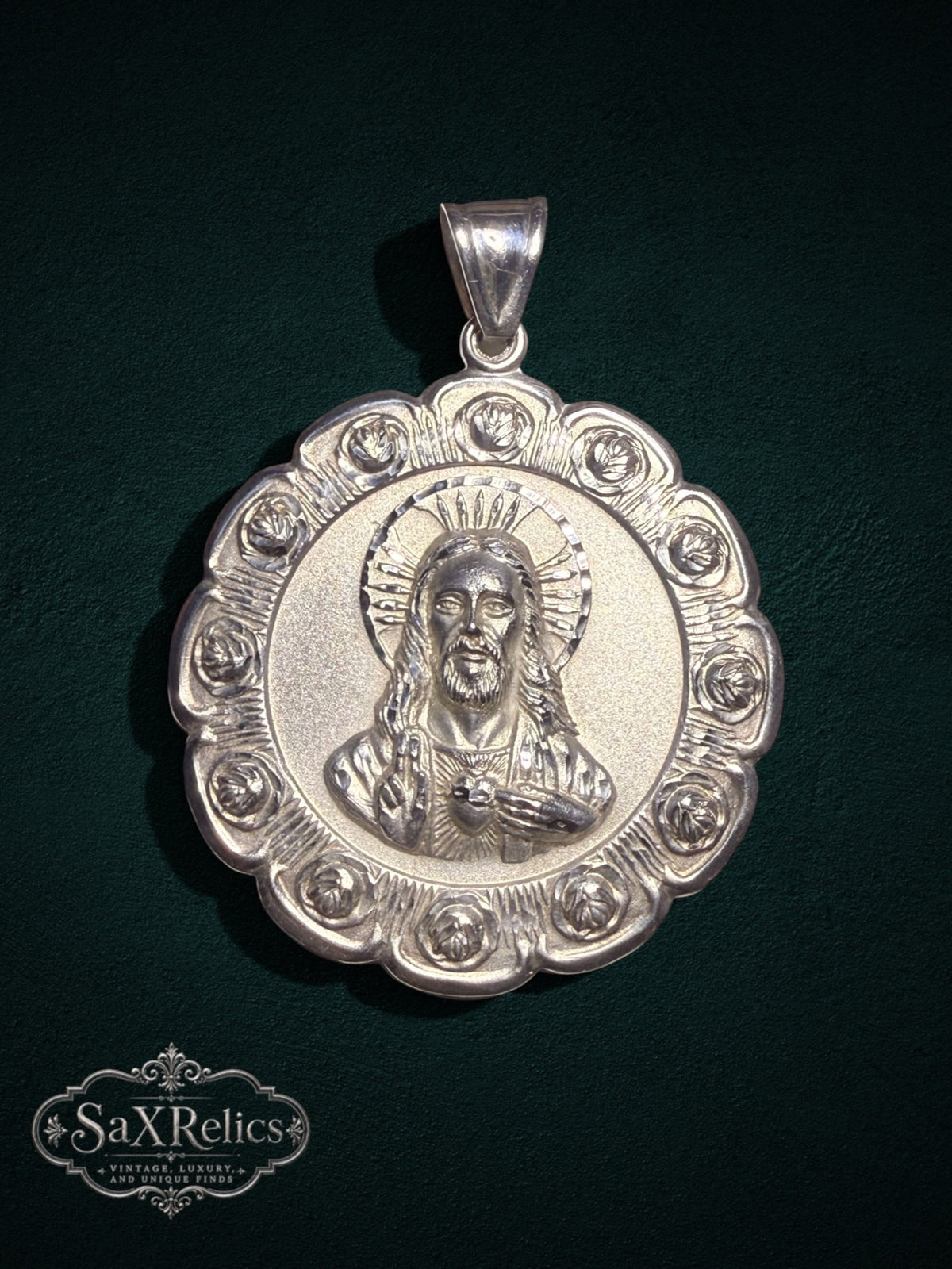 Sterling silver Sacred Heart of Jesus pendant with ornate rose border and high-relief detail