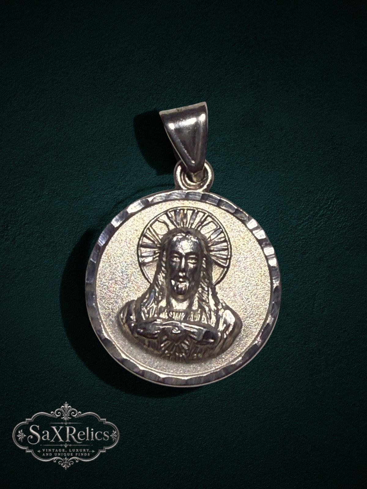 Milagro sterling silver medallion, Sacred Heart side with hammered border