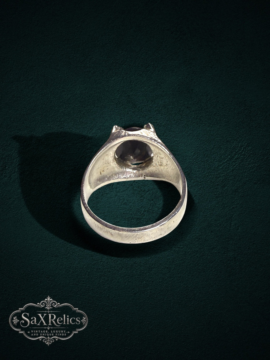 My Store SAXRelics sterling silver statement ring with a dark oval gemstone in a four-prong setting