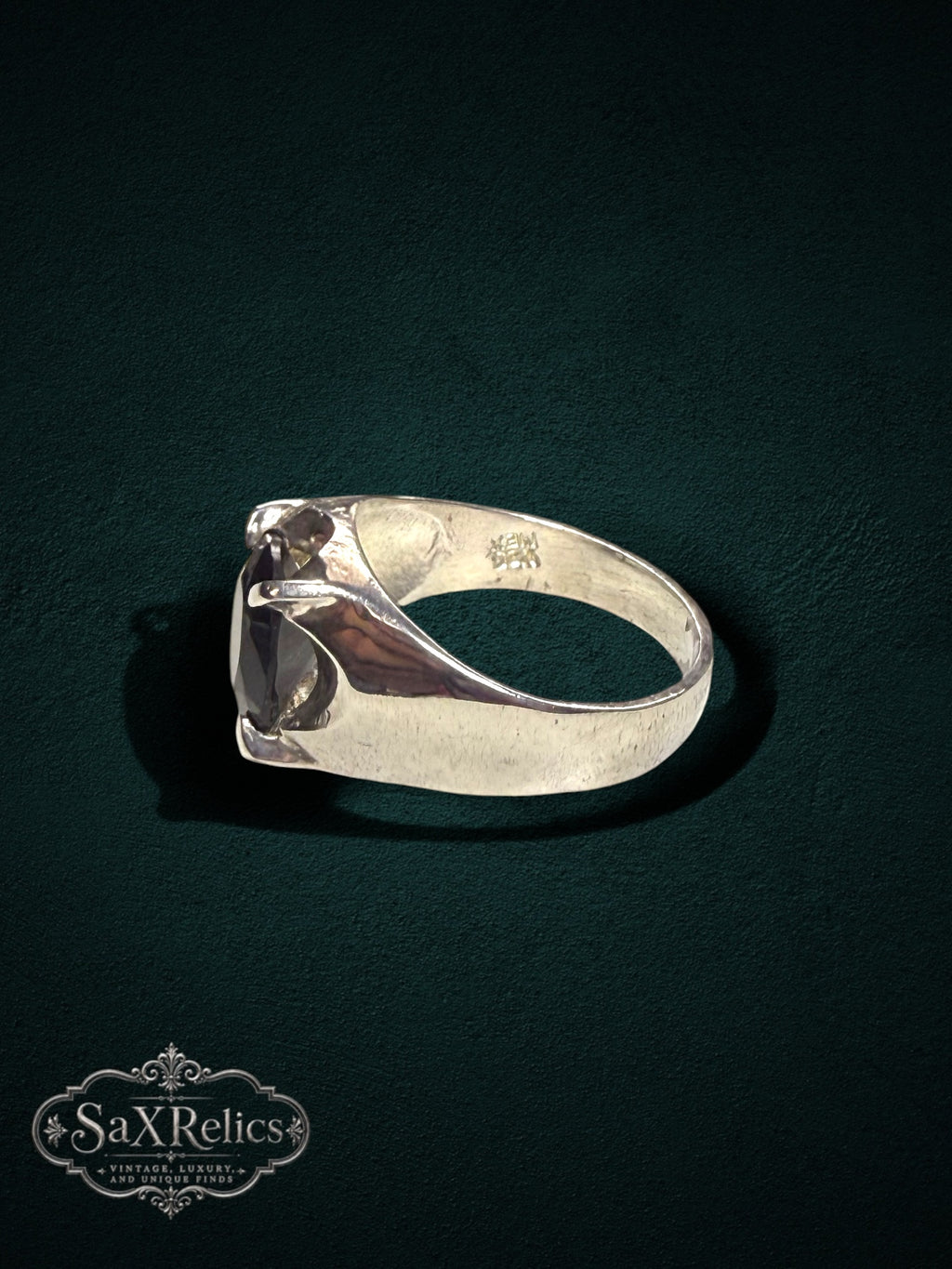 My Store SAXRelics sterling silver statement ring with a dark oval gemstone in a four-prong setting