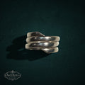 My Store SAXRelics sterling silver multi-layered wrap ring with a polished, sculptural coil design.