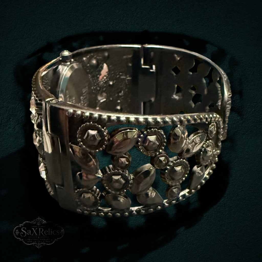 My Store STUDIO cuff bracelet watch in gunmetal tone with intricate open-work metal design and sparkling crystals.