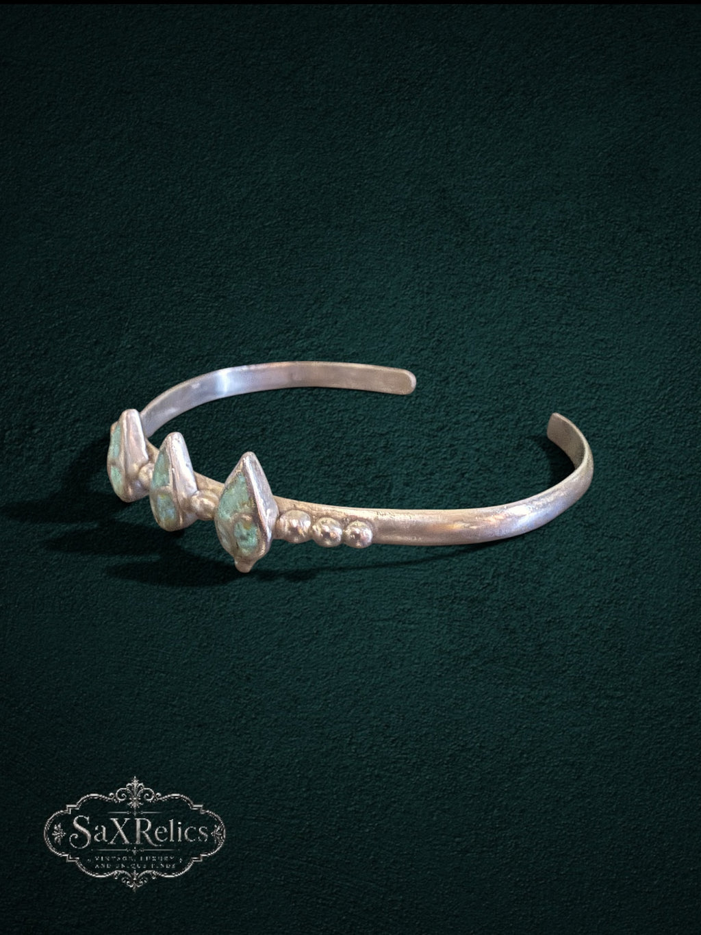 My Store sterling silver cuff bracelet featuring three teardrop turquoise stones and delicate bead detailing.