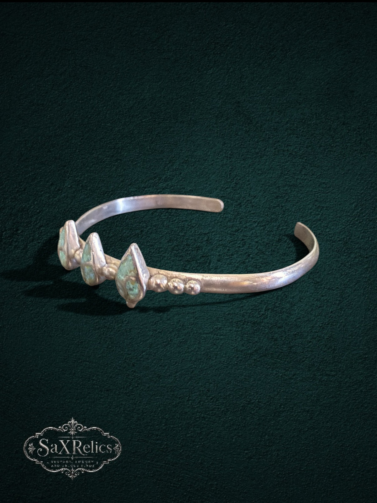 My Store sterling silver cuff bracelet featuring three teardrop turquoise stones and delicate bead detailing.