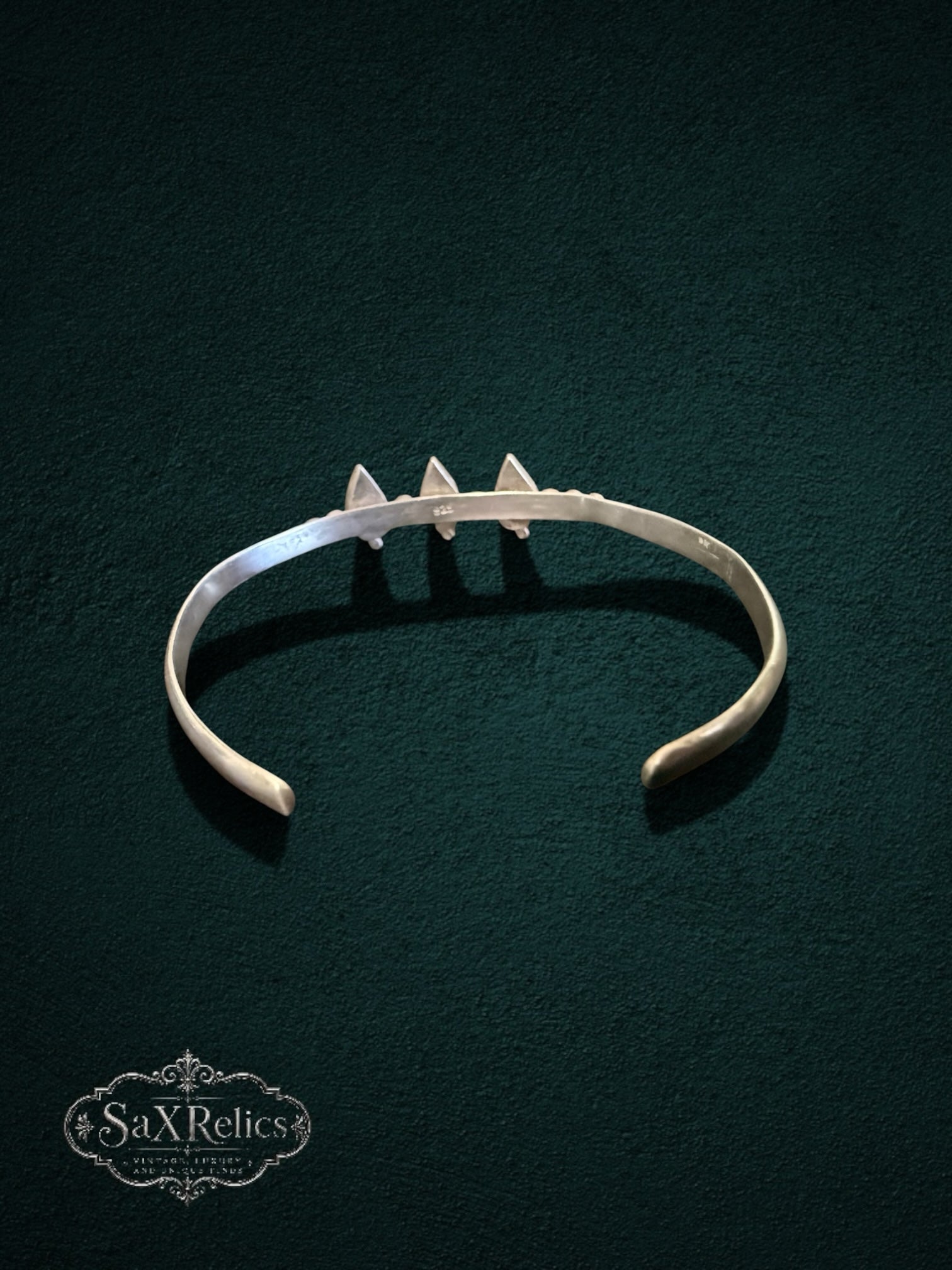 My Store sterling silver cuff bracelet featuring three teardrop turquoise stones and delicate bead detailing.