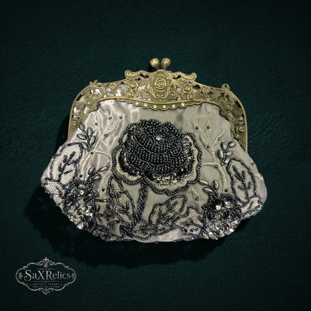 My Store vintage-inspired satin evening clutch with intricate black floral beadwork and an antique brass frame.