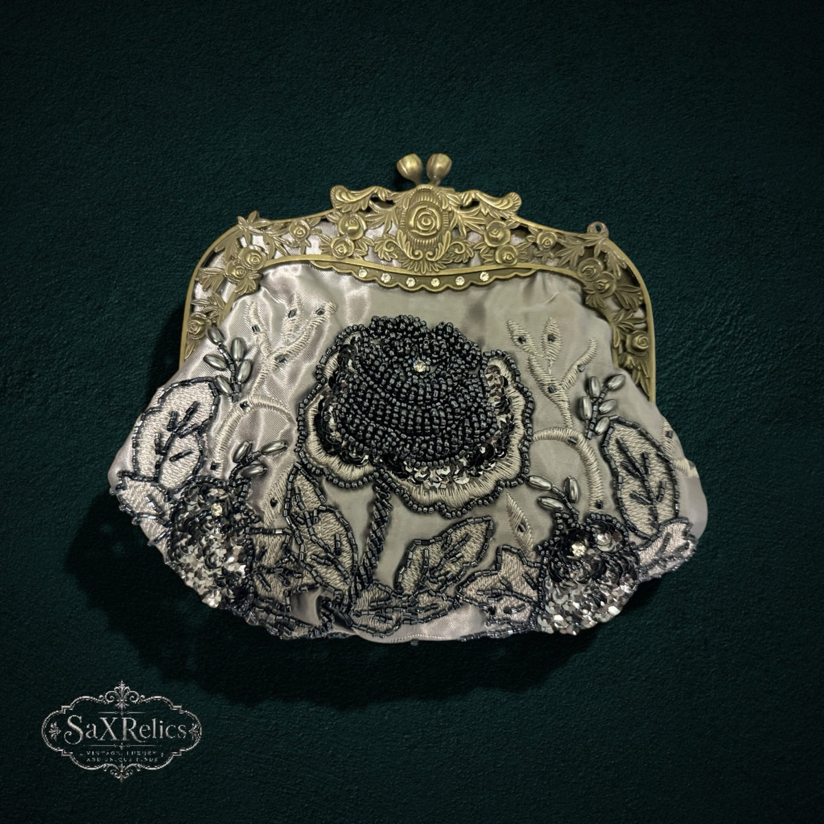 My Store vintage-inspired satin evening clutch with intricate black floral beadwork and an antique brass frame.
