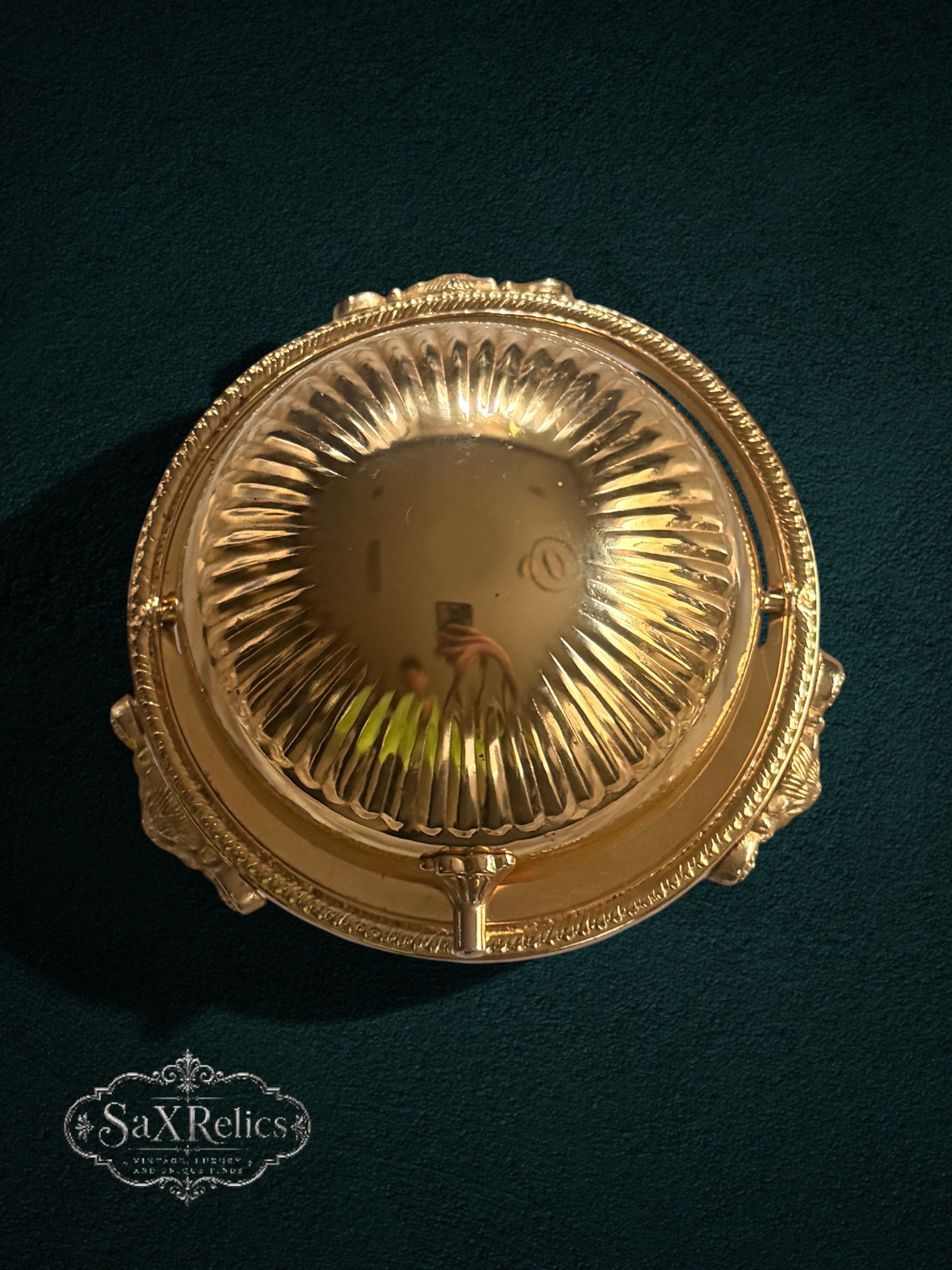 My Store vintage brass butter dish with a fluted domed lid and ornate lion-paw feet, top-down view