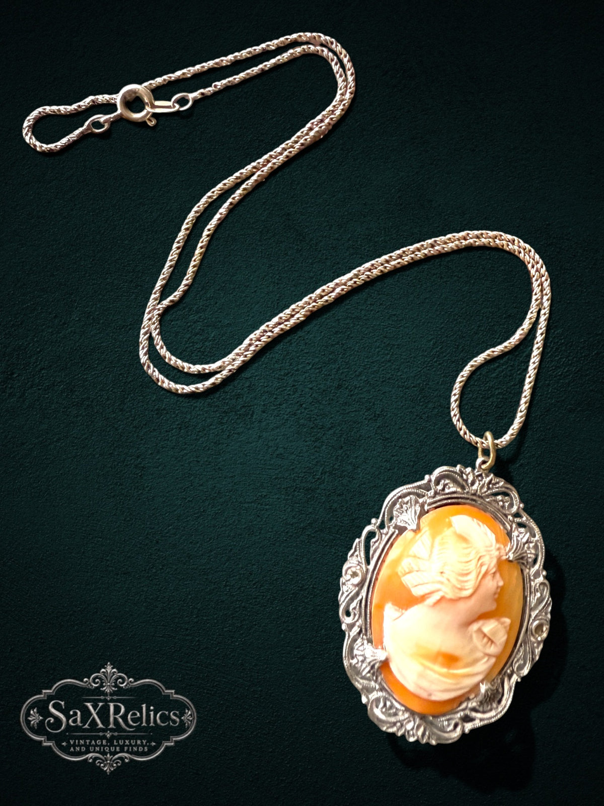 My Store vintage cameo pendant necklace with a peach shell profile in an ornate sterling silver filigree setting
