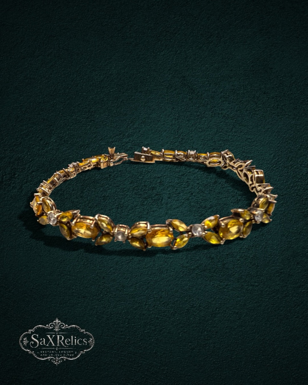 My Store vintage-inspired gold link bracelet featuring marquise-cut yellow citrine-style stones and clear accents.