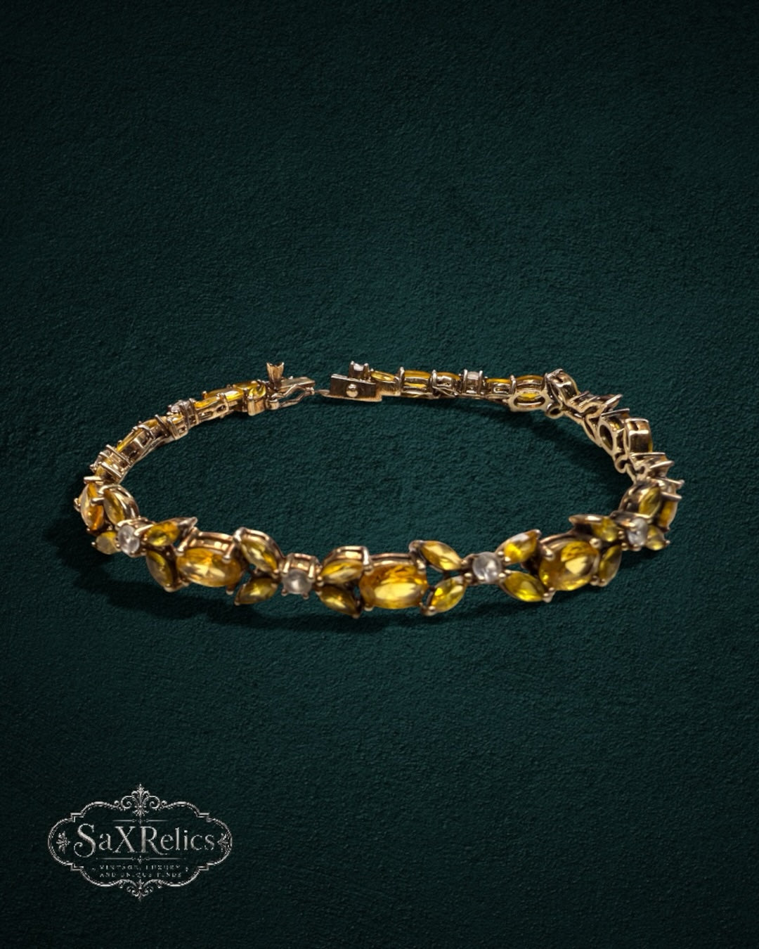 My Store vintage-inspired gold link bracelet featuring marquise-cut yellow citrine-style stones and clear accents.