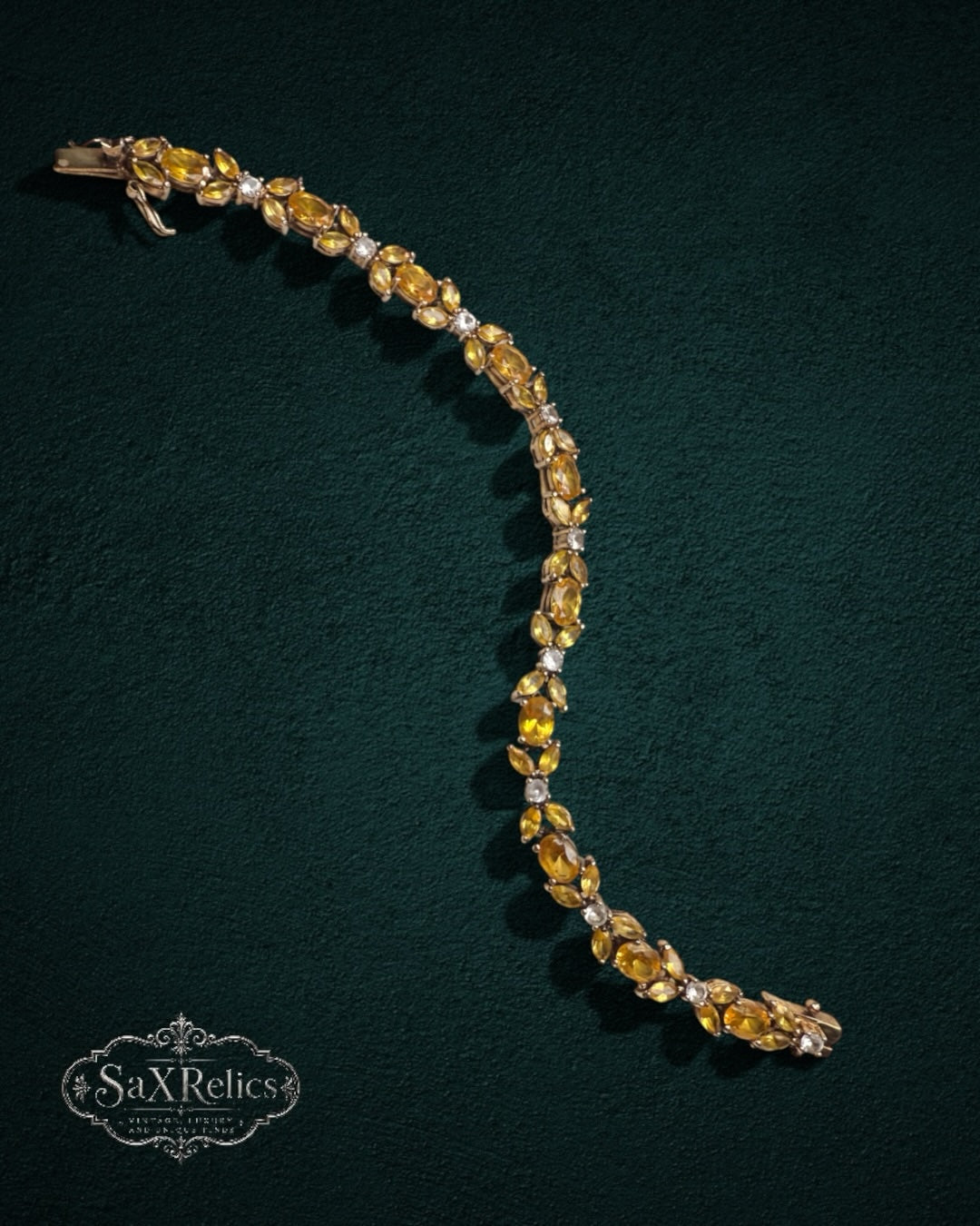 My Store vintage-inspired link bracelet featuring marquise-cut yellow citrine-style stones and clear accents.