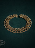My Store vintage gold-filled multi-strand rope chain bracelet with intricate interlocking links on dark background