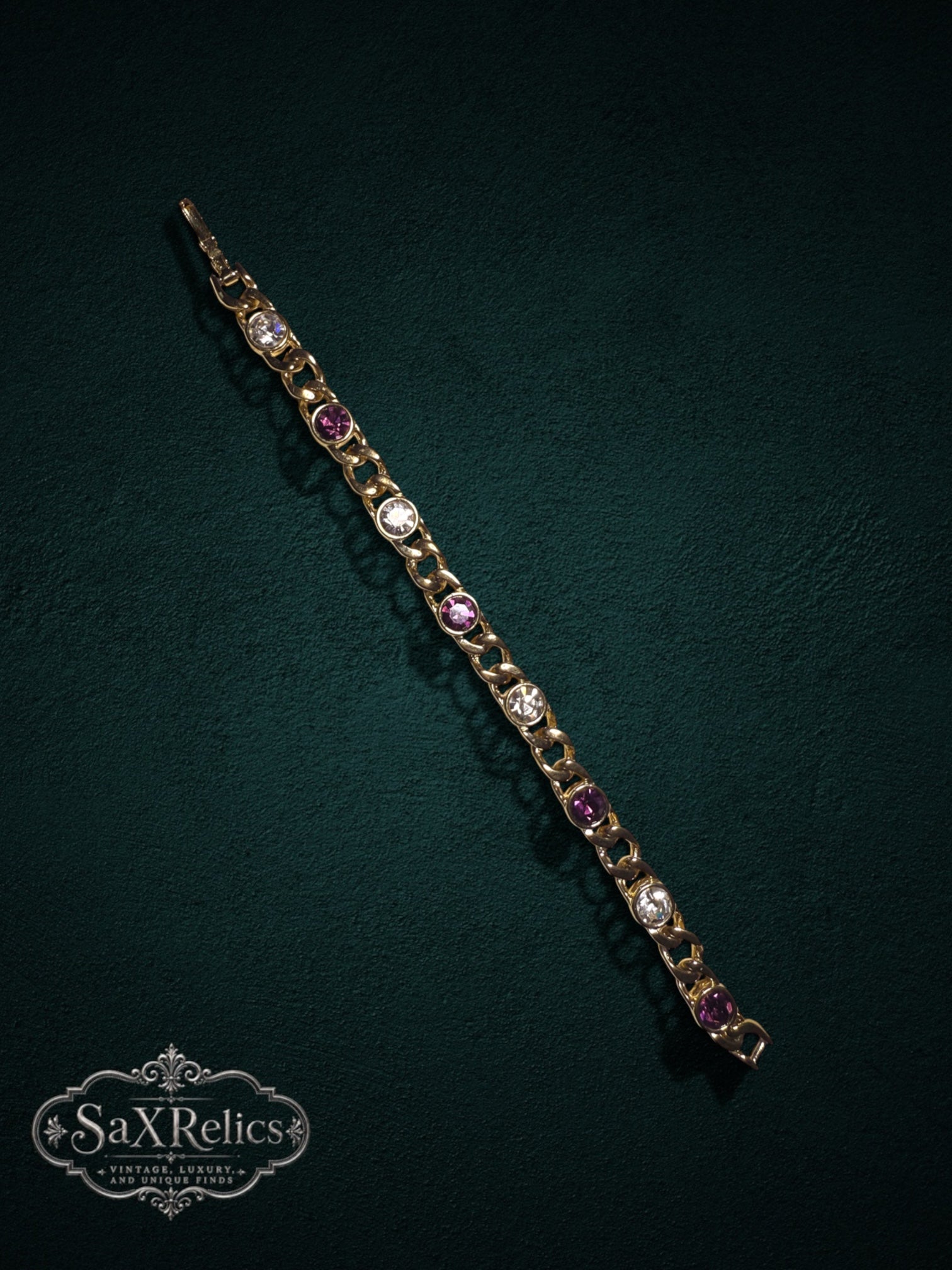 My Store vintage gold-tone curb chain bracelet with alternating purple and clear round-cut crystals on dark background