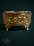My Store vintage-style oval gold metal trinket box with intricate floral filigree and plush velvet interior lining.