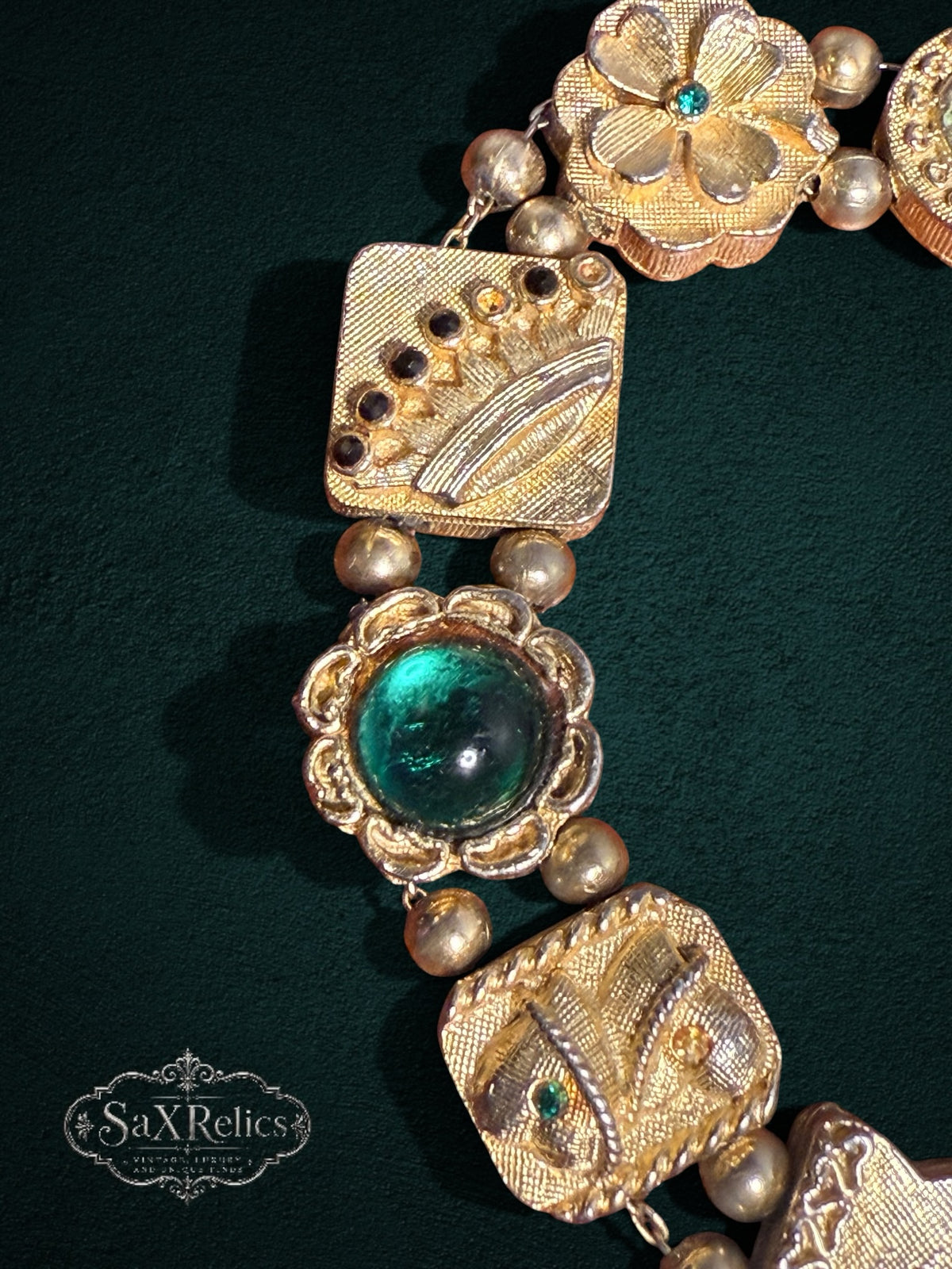 My Store vintage gold-tone link bracelet with emerald green cabochon stones, floral motifs, and sparkling crystals.