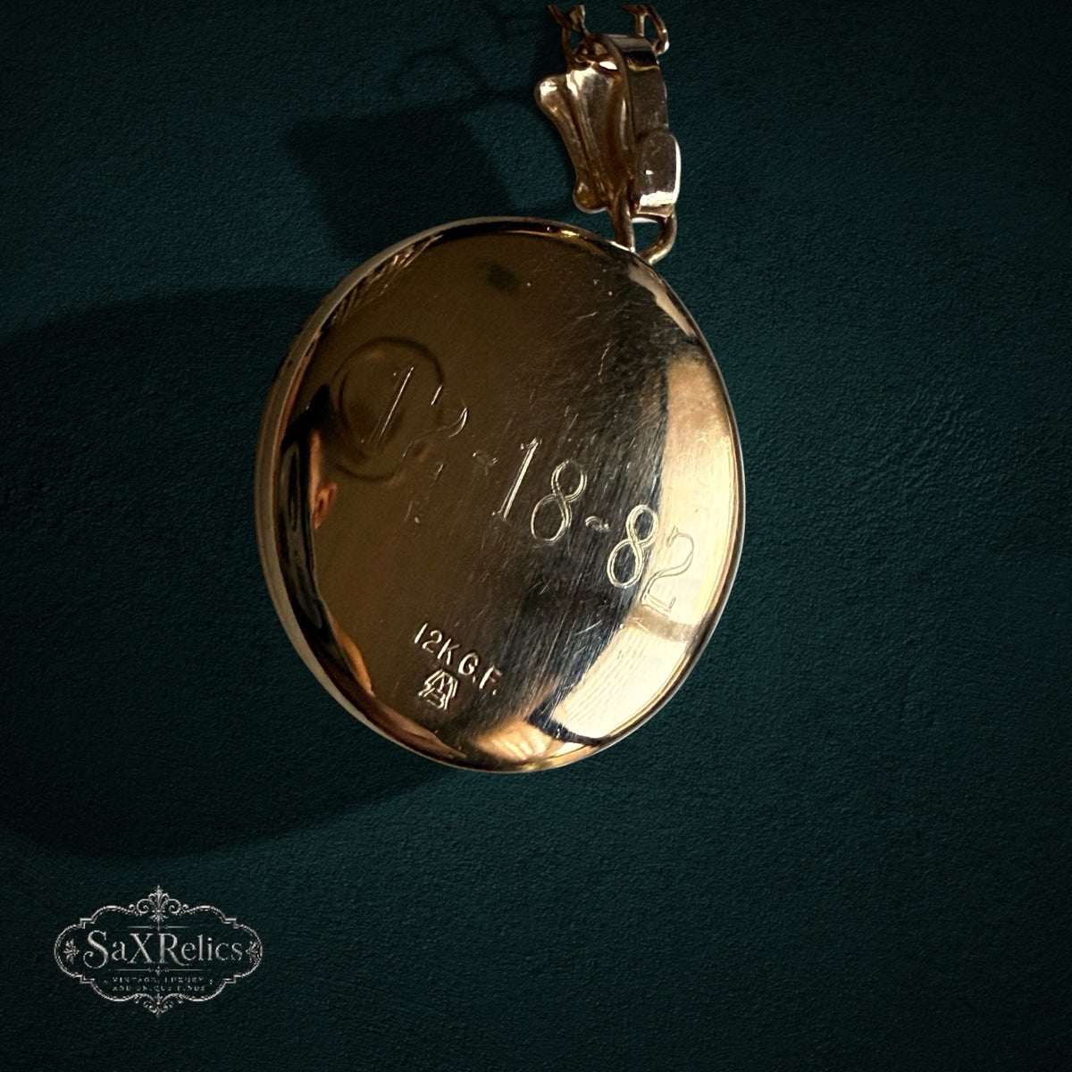 SaX Relics — Recuerdo locket reverse engraved 12-18-82 with the 12K GF hallmark.