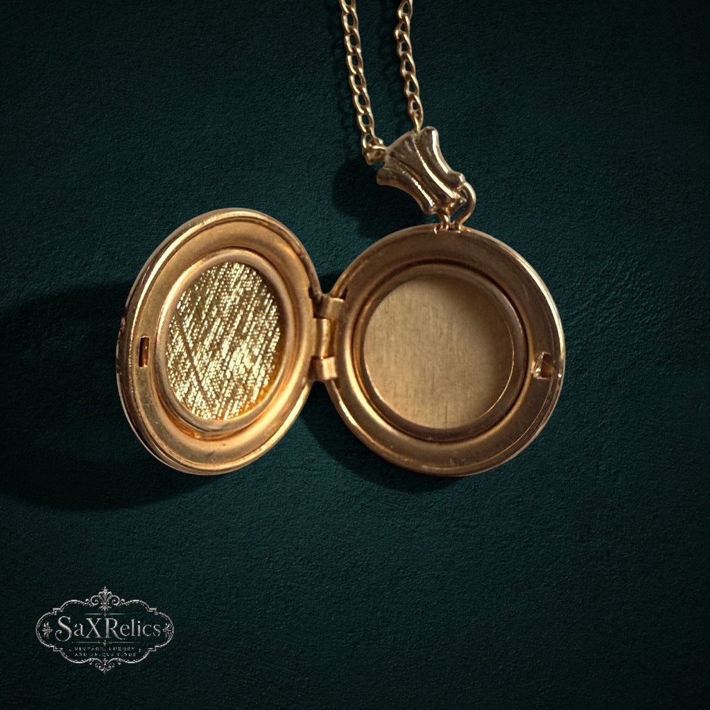 SaX Relics — Recuerdo locket opened to show the classic photo interior.