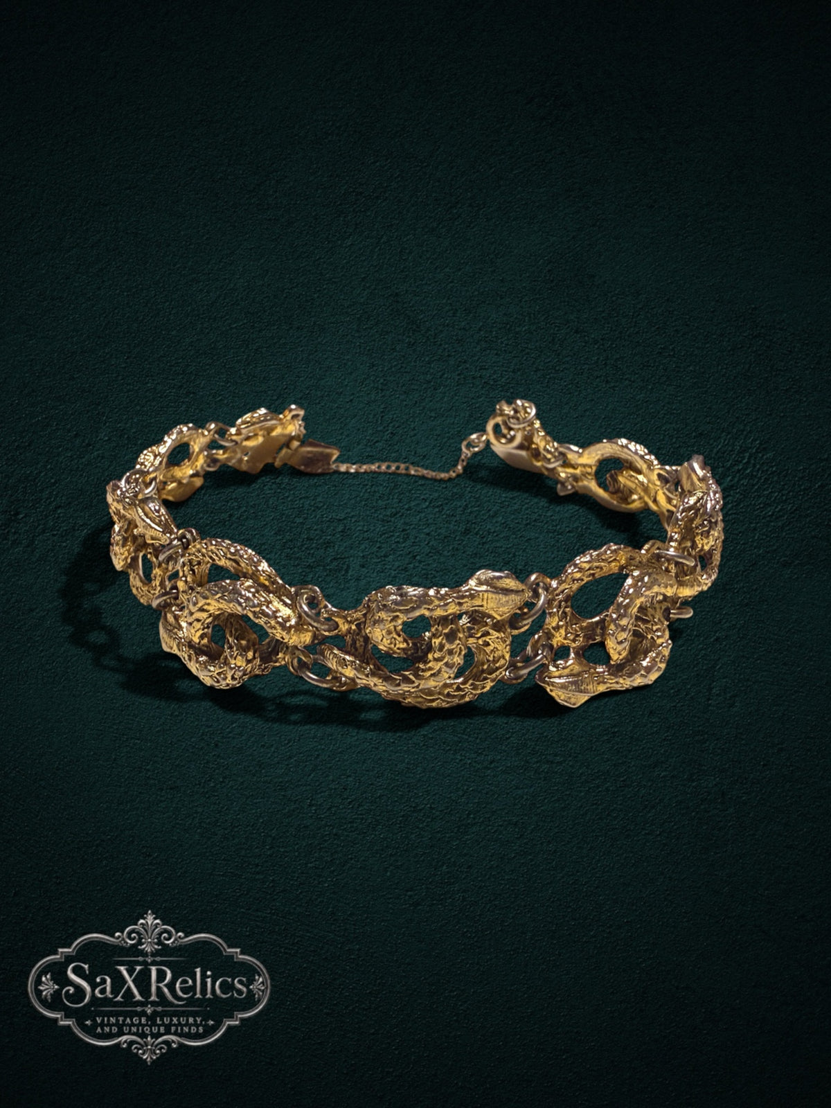 My Store vintage gold-tone serpent link bracelet with intricate textured snake motifs and a secure box clasp.