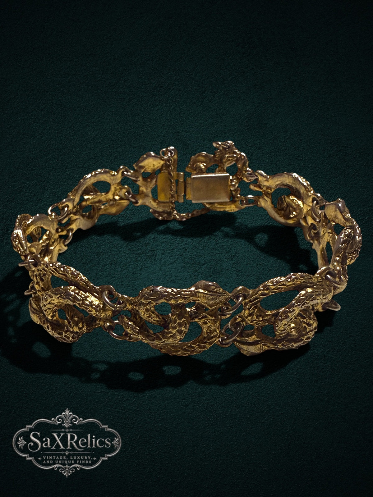 My Store vintage gold-tone serpent link bracelet with intricate textured snake motifs and a secure box clasp.