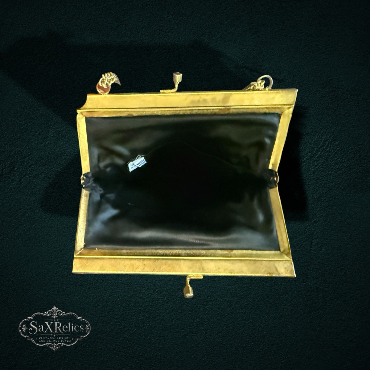 My Store vintage evening handbag interior with black lining and gold-tone metal kiss-lock frame