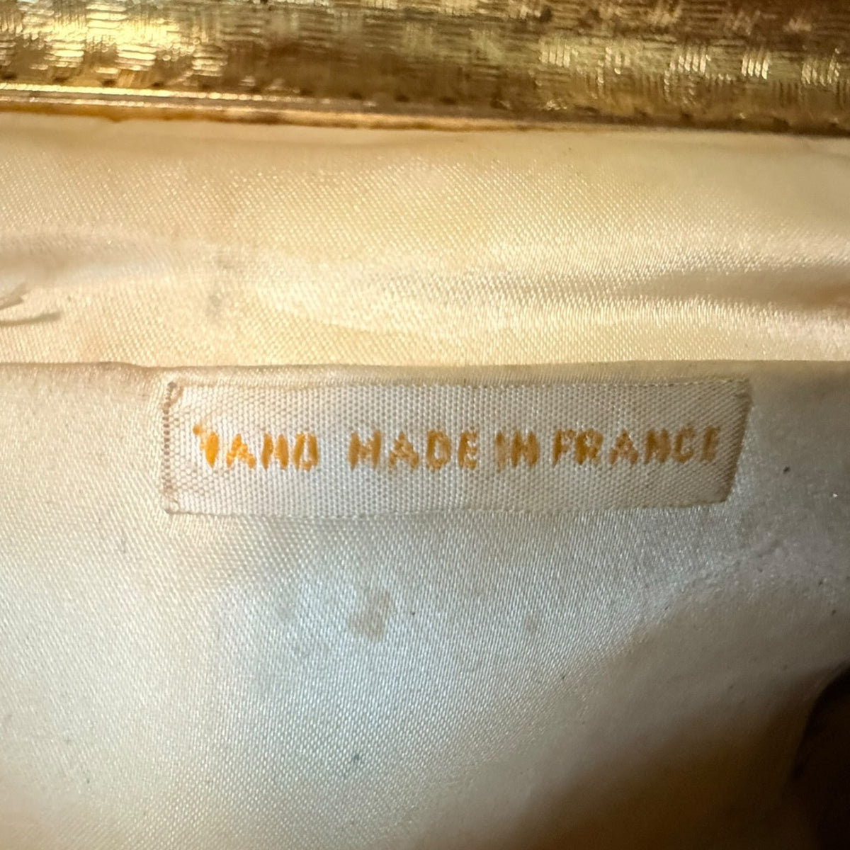 My Store vintage handbag interior label reading Hand Made In France with cream fabric lining and gold frame