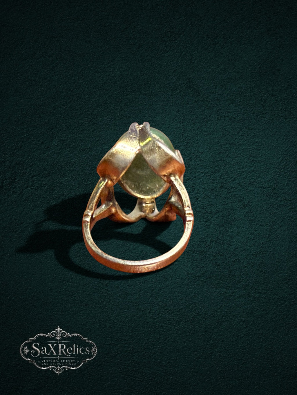 My Store vintage SaxRelics statement ring featuring a green jade cabochon in a sculptural gold-tone setting