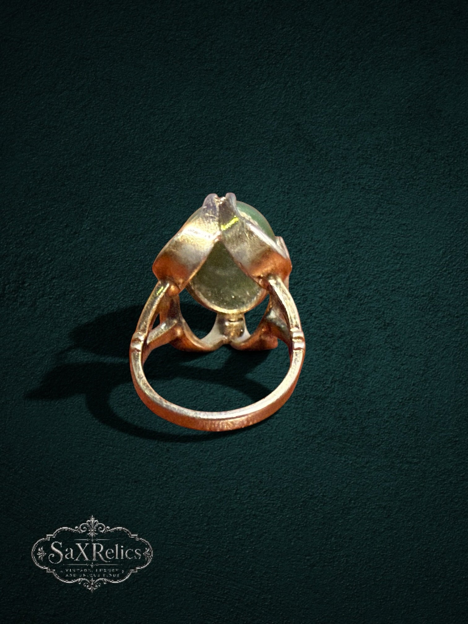 My Store vintage SaxRelics statement ring featuring a green jade cabochon in a sculptural gold-tone setting