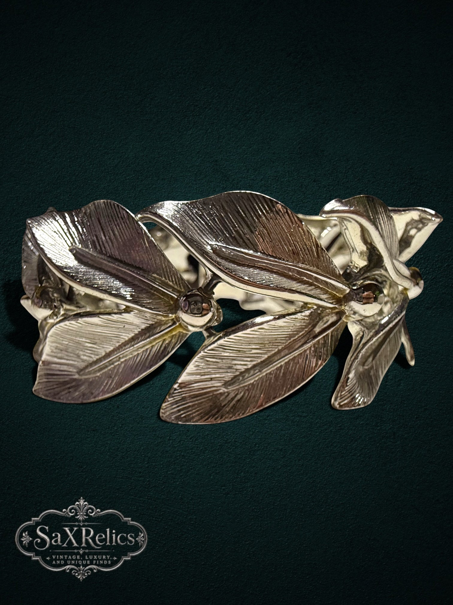 My Store vintage-inspired silver-tone link bracelet featuring intricately textured overlapping leaves and metallic beads.