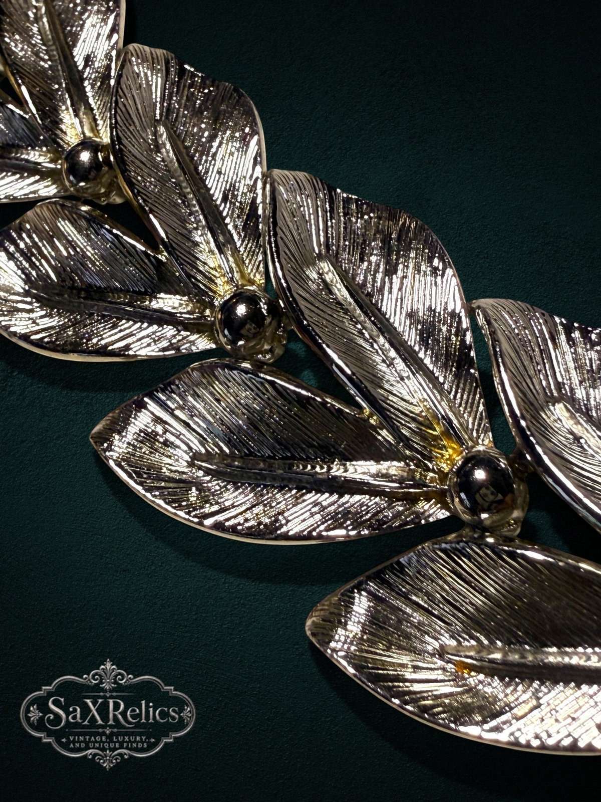 My Store vintage-inspired silver-tone link bracelet featuring intricately textured overlapping leaves and metal beads.