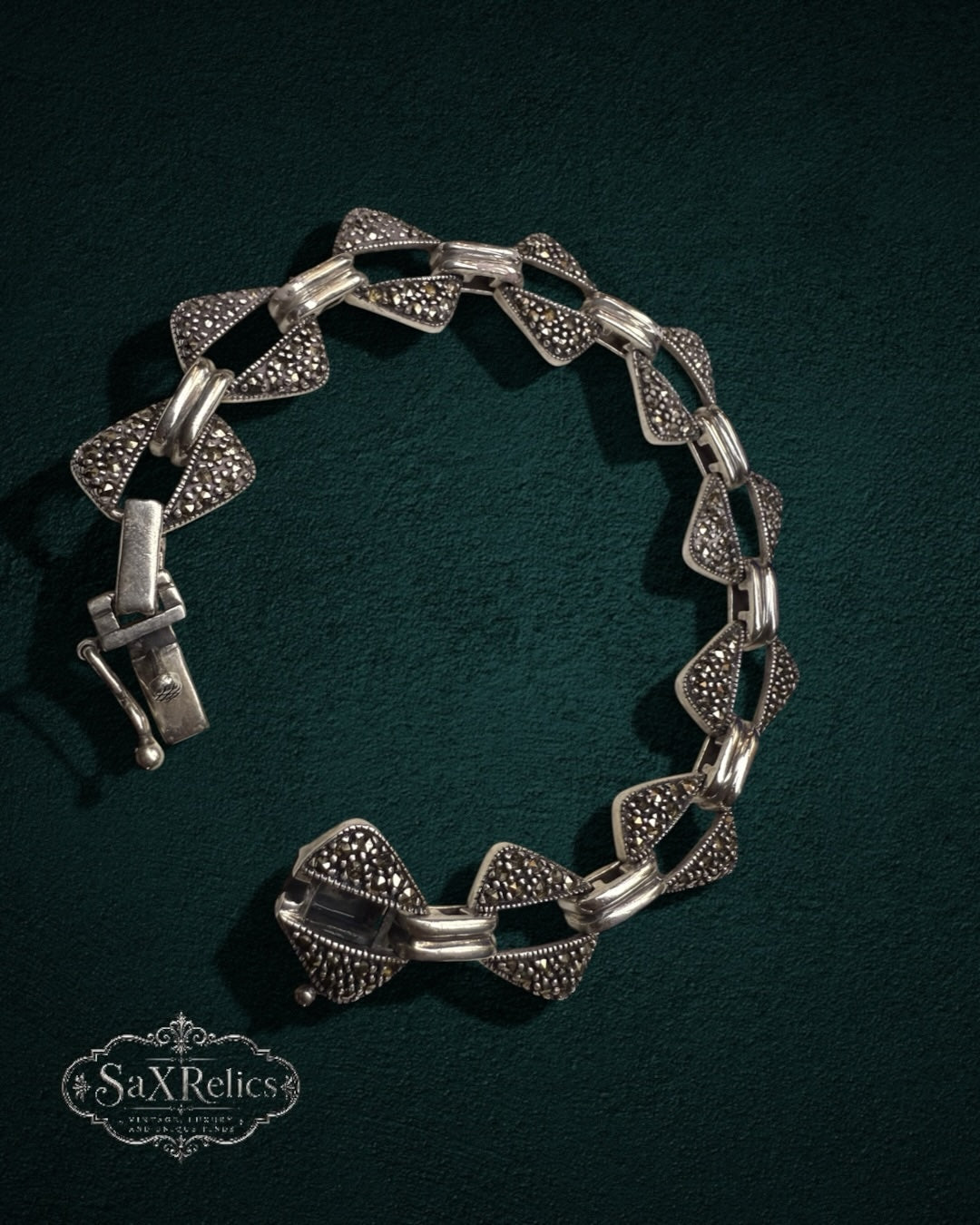 My Store vintage sterling silver bracelet featuring geometric triangular links with shimmering pavé-set marcasite stones.